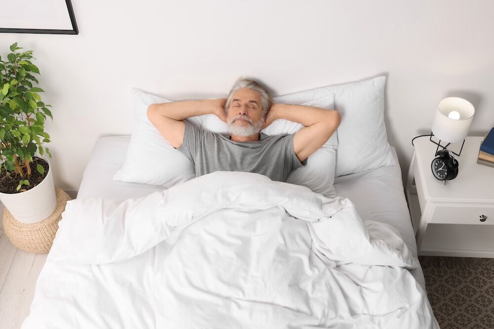 A resident of the assisted living in Palm Springs resting in his room