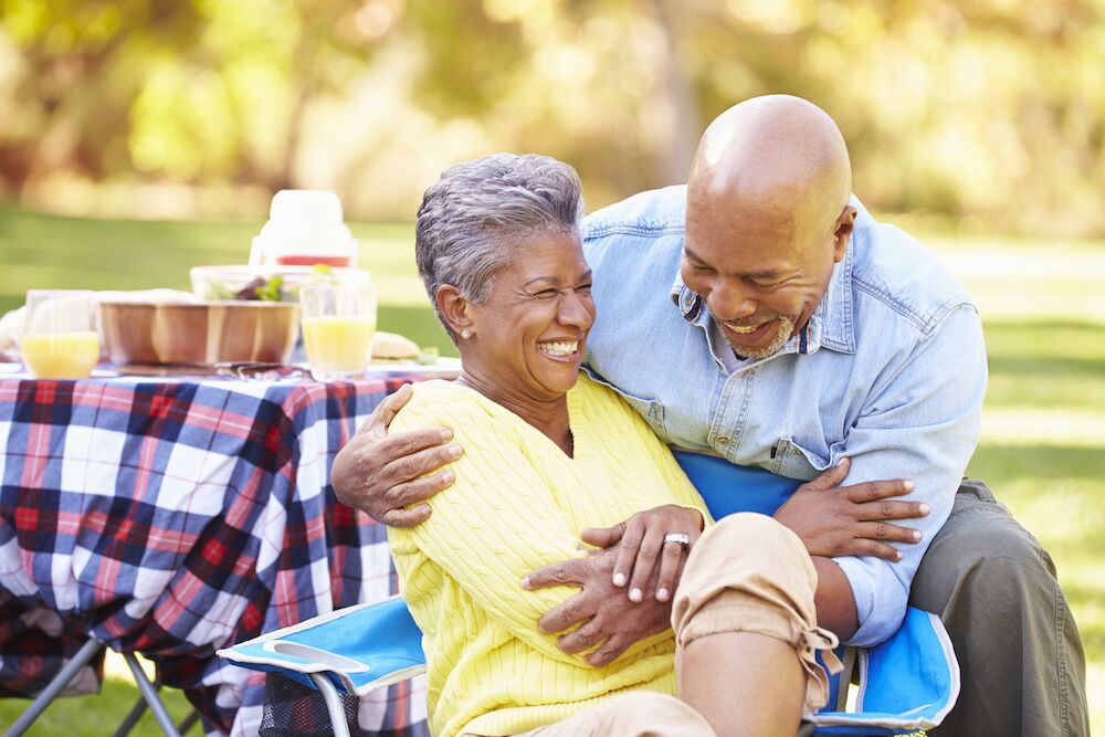 A senior couple enjoying a picnic at Palm Springs senior living