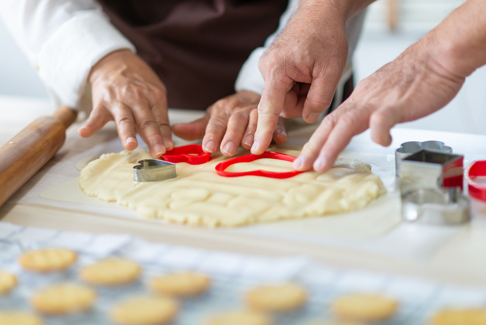 Seniors baking sugar cookies together