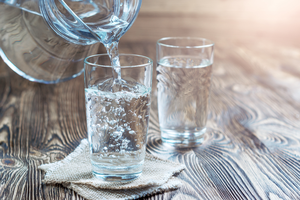 A water glass being filled