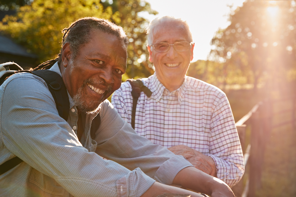 Two senior men out on a walk together