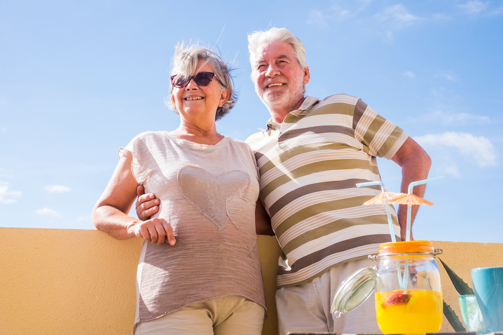 A happy senior couple spends time together outdoors