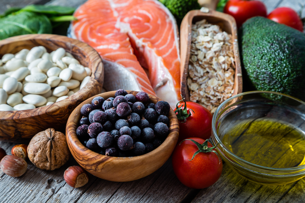 Heart healthy foods arranged on a table