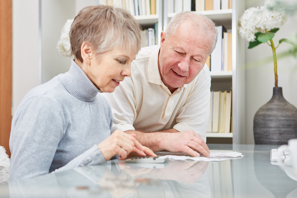 A senior couple figuring out finances 